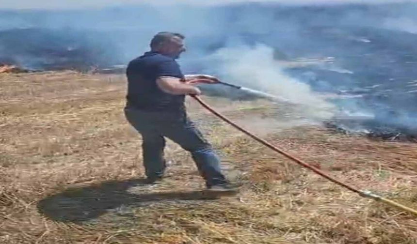 Muhtar ve eşi yangını söndürmek için seferber oldu
